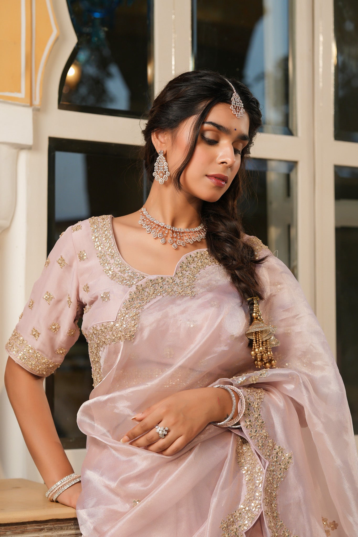 Shop powder pink tissue silk saree online in USA with scalloped border. Make a fashion statement at weddings with stunning designer sarees, embroidered sarees with blouse, wedding sarees, handloom sarees from Pure Elegance Indian fashion store in USA.-closeup