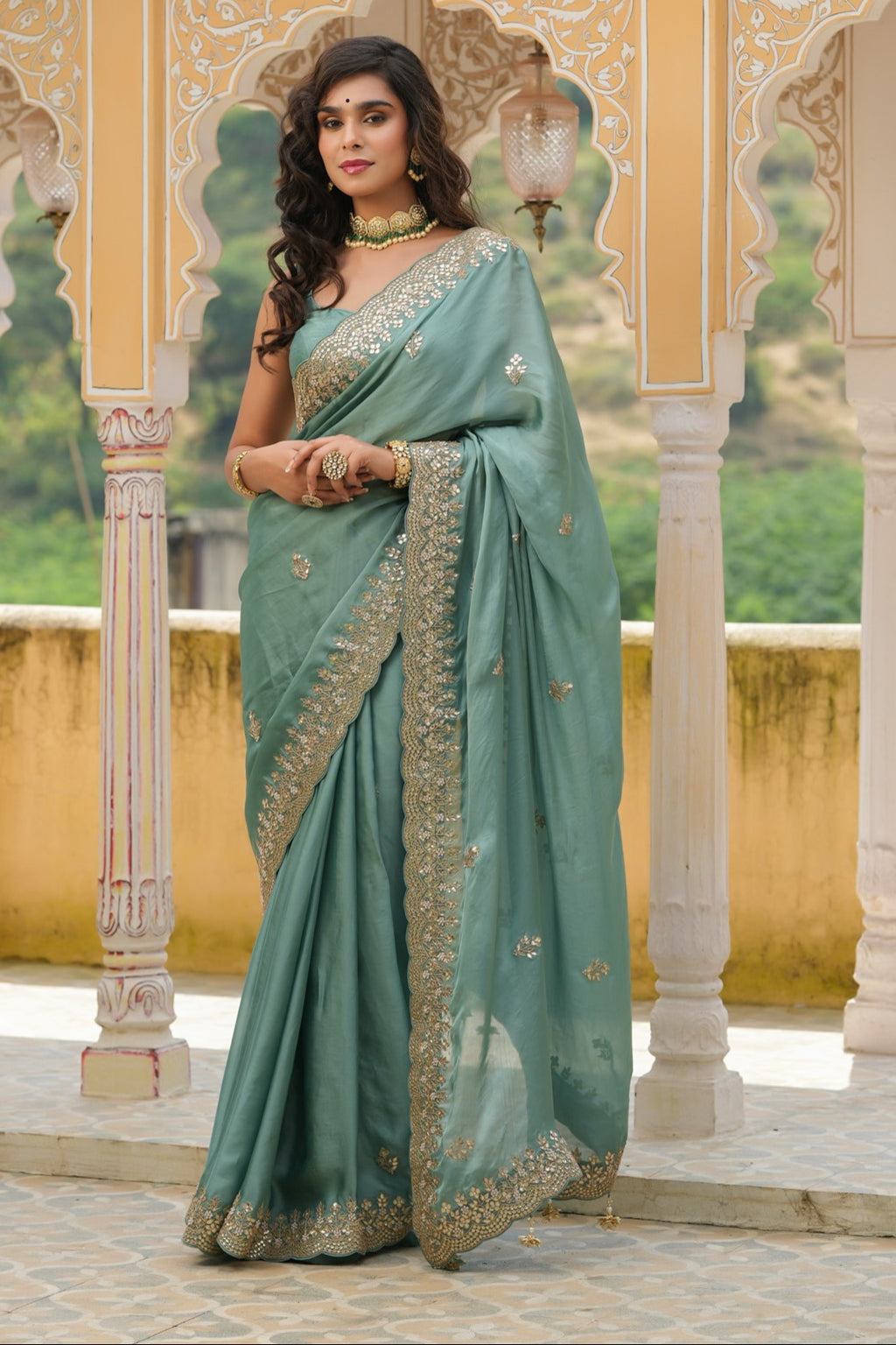 Shop sea green tussar georgette saree online in USA with embroidered border. Make a fashion statement at weddings with stunning designer sarees, embroidered sarees with blouse, wedding sarees, handloom sarees from Pure Elegance Indian fashion store in USA.-full view