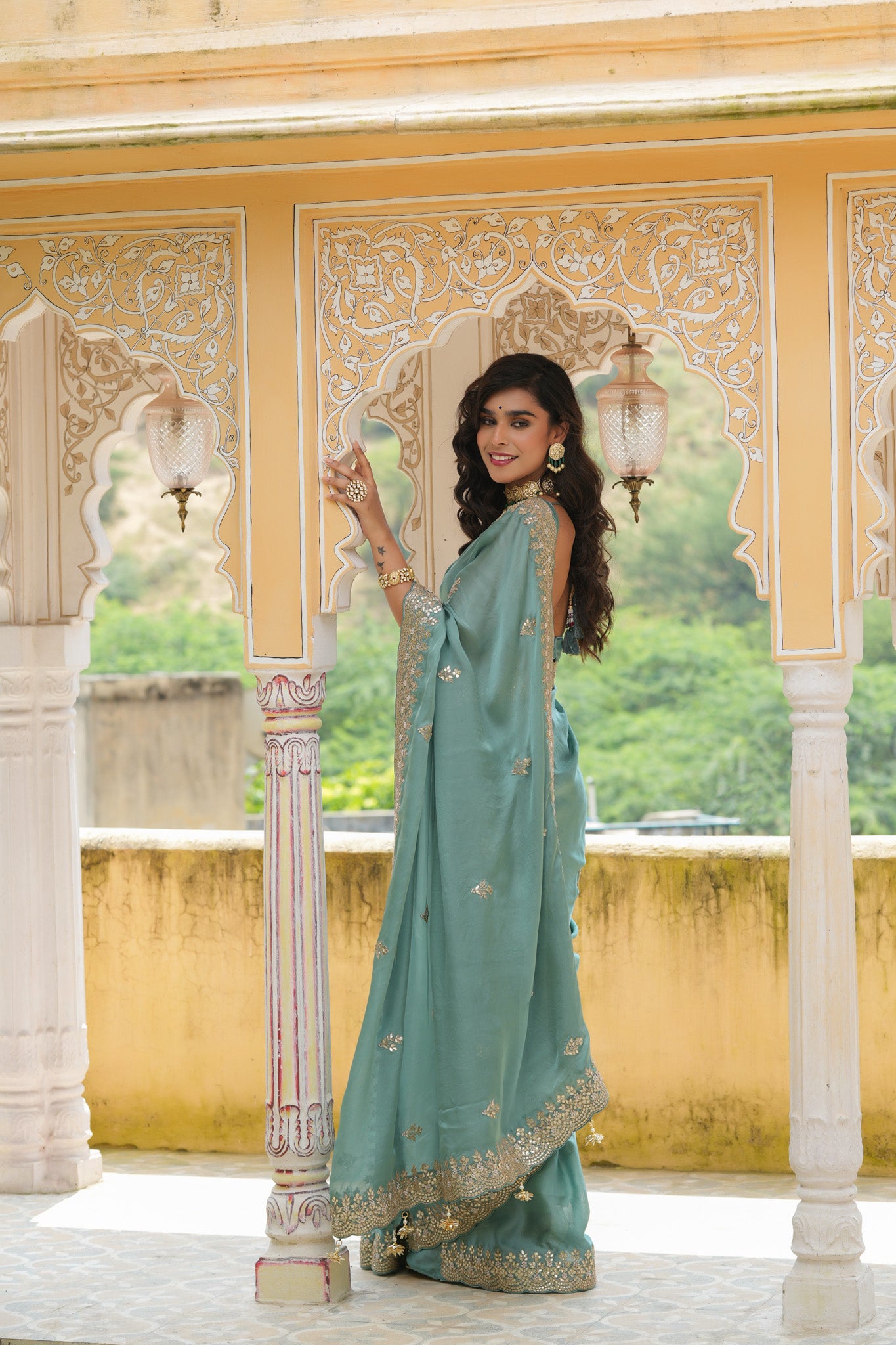 Shop sea green tussar georgette saree online in USA with embroidered border. Make a fashion statement at weddings with stunning designer sarees, embroidered sarees with blouse, wedding sarees, handloom sarees from Pure Elegance Indian fashion store in USA.-side