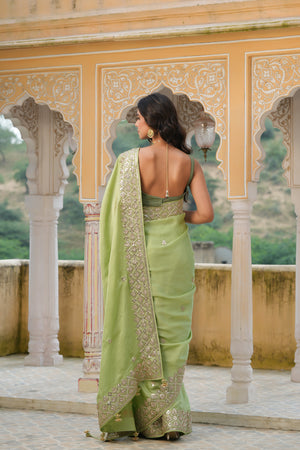 Buy beautiful pista green embroidered tussar georgette saree online in USA with saree blouse. Make a fashion statement at weddings with stunning designer sarees, embroidered sarees with blouse, wedding sarees, handloom sarees from Pure Elegance Indian fashion store in USA.-back
