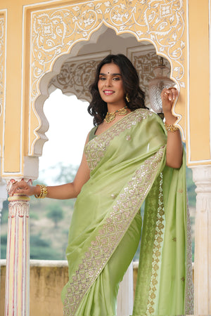 Buy beautiful pista green embroidered tussar georgette saree online in USA with saree blouse. Make a fashion statement at weddings with stunning designer sarees, embroidered sarees with blouse, wedding sarees, handloom sarees from Pure Elegance Indian fashion store in USA.-closeup
