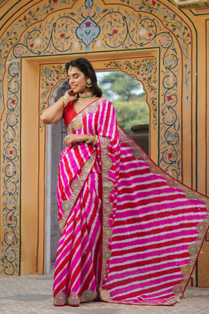 Shop beautiful pink and red stripes embroidered tussar georgette saree online in USA with saree blouse. Make a fashion statement at weddings with stunning designer sarees, embroidered sarees with blouse, wedding sarees, handloom sarees from Pure Elegance Indian fashion store in USA.-pallu
