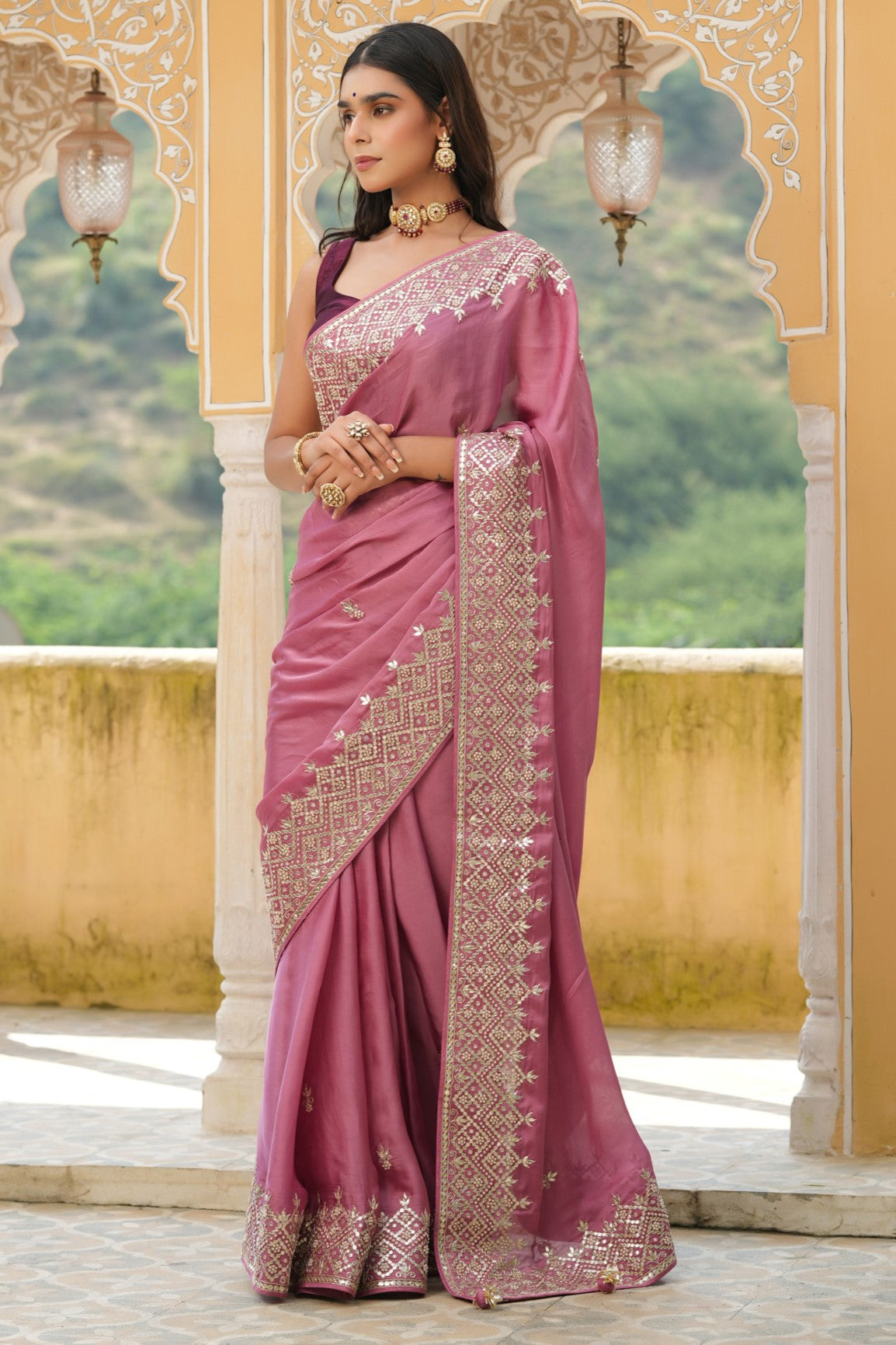 Buy onion pink embroidered tussar georgette saree online in USA with blouse. Make a fashion statement at weddings with stunning designer sarees, embroidered sarees with blouse, wedding sarees, handloom sarees from Pure Elegance Indian fashion store in USA.-full view