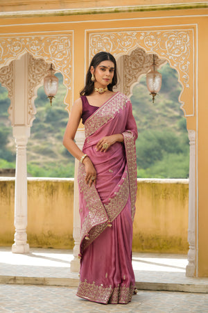 Buy onion pink embroidered tussar georgette saree online in USA with blouse. Make a fashion statement at weddings with stunning designer sarees, embroidered sarees with blouse, wedding sarees, handloom sarees from Pure Elegance Indian fashion store in USA.-front