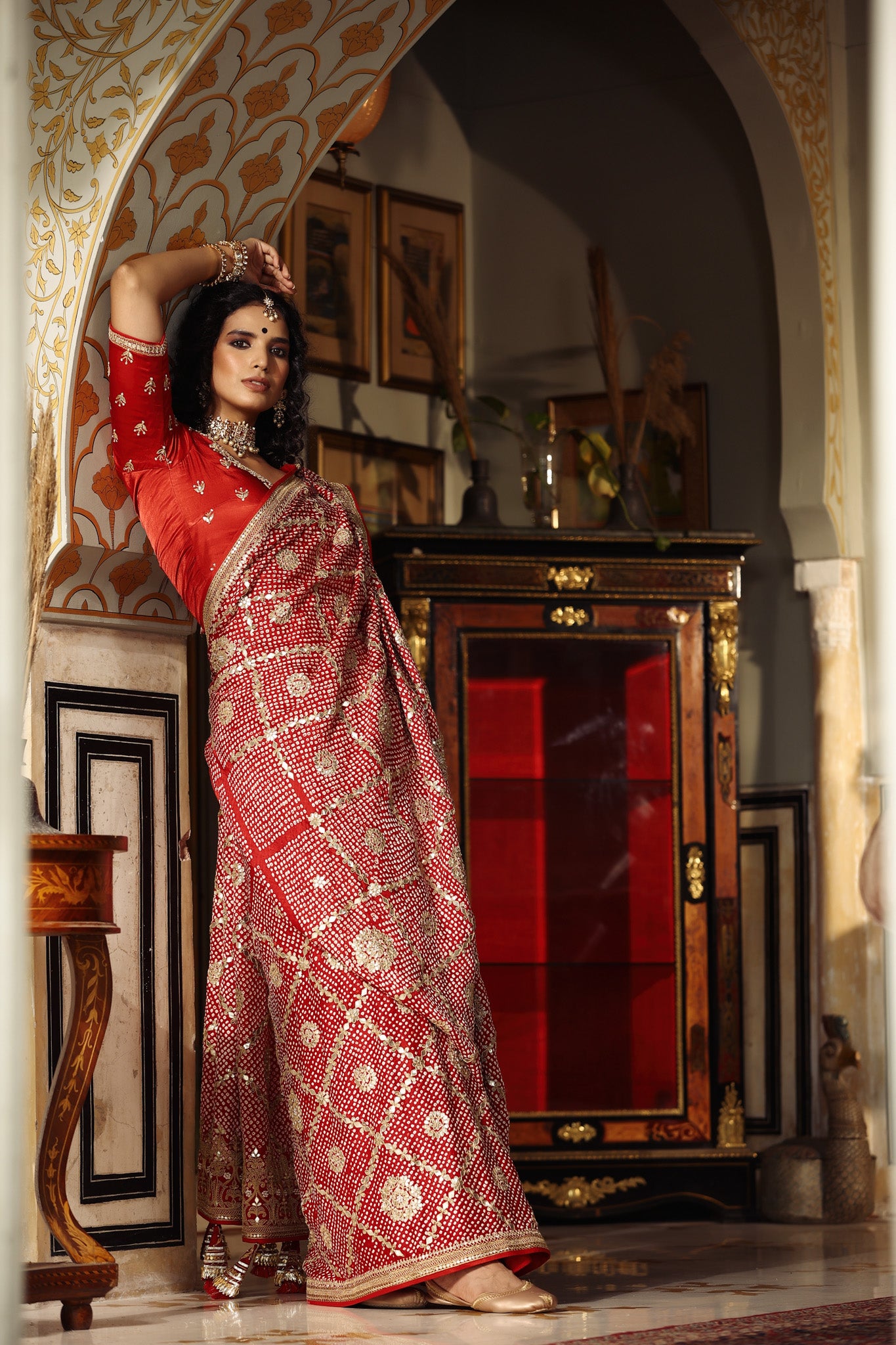 Shop red embroidered bandhej Banarasi saree online in USA with blouse. Make a fashion statement at weddings with stunning designer sarees, embroidered sarees with blouse, wedding sarees, handloom sarees from Pure Elegance Indian fashion store in USA.-side