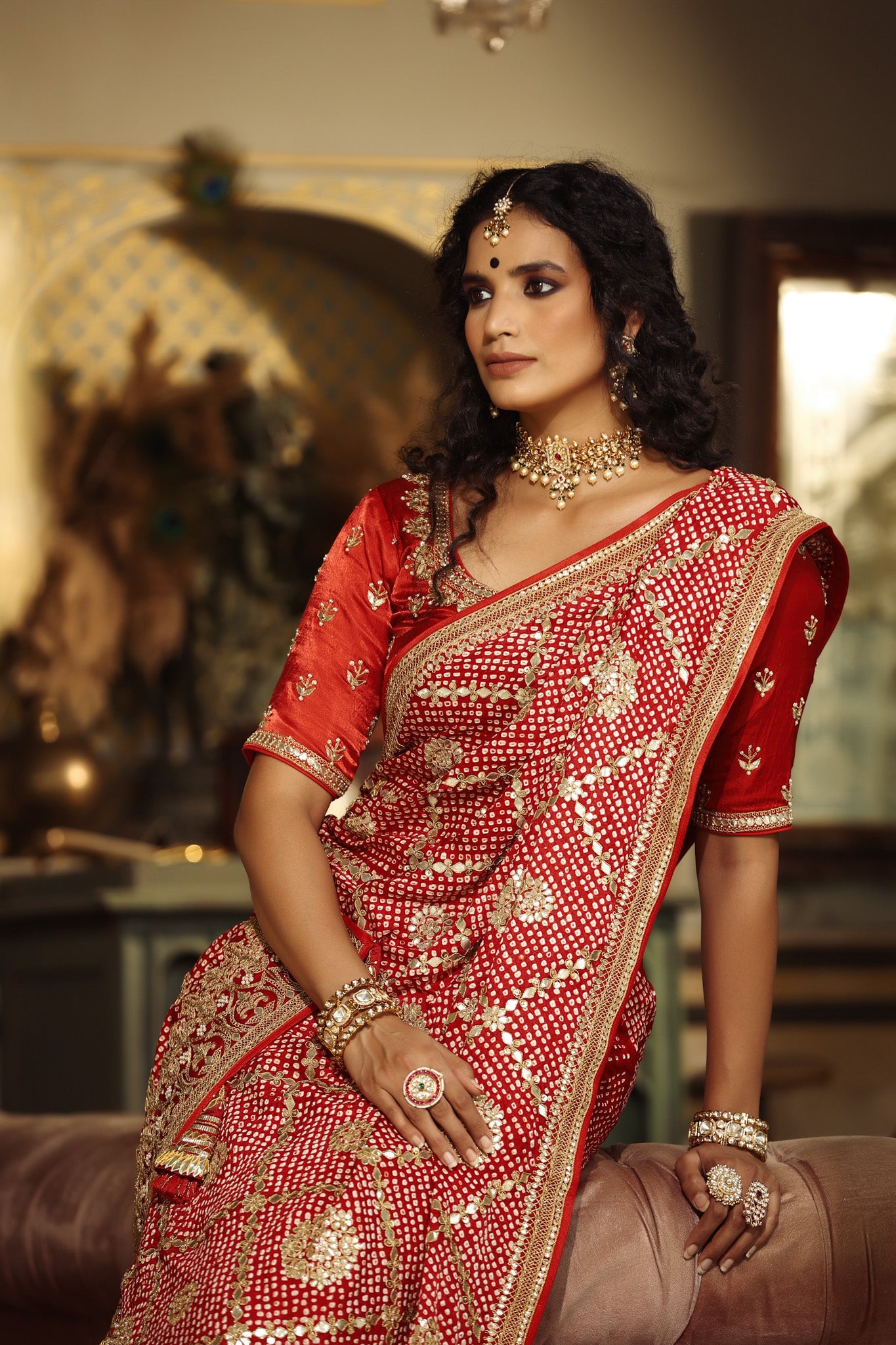 Shop red embroidered bandhej Banarasi saree online in USA with blouse. Make a fashion statement at weddings with stunning designer sarees, embroidered sarees with blouse, wedding sarees, handloom sarees from Pure Elegance Indian fashion store in USA.-details