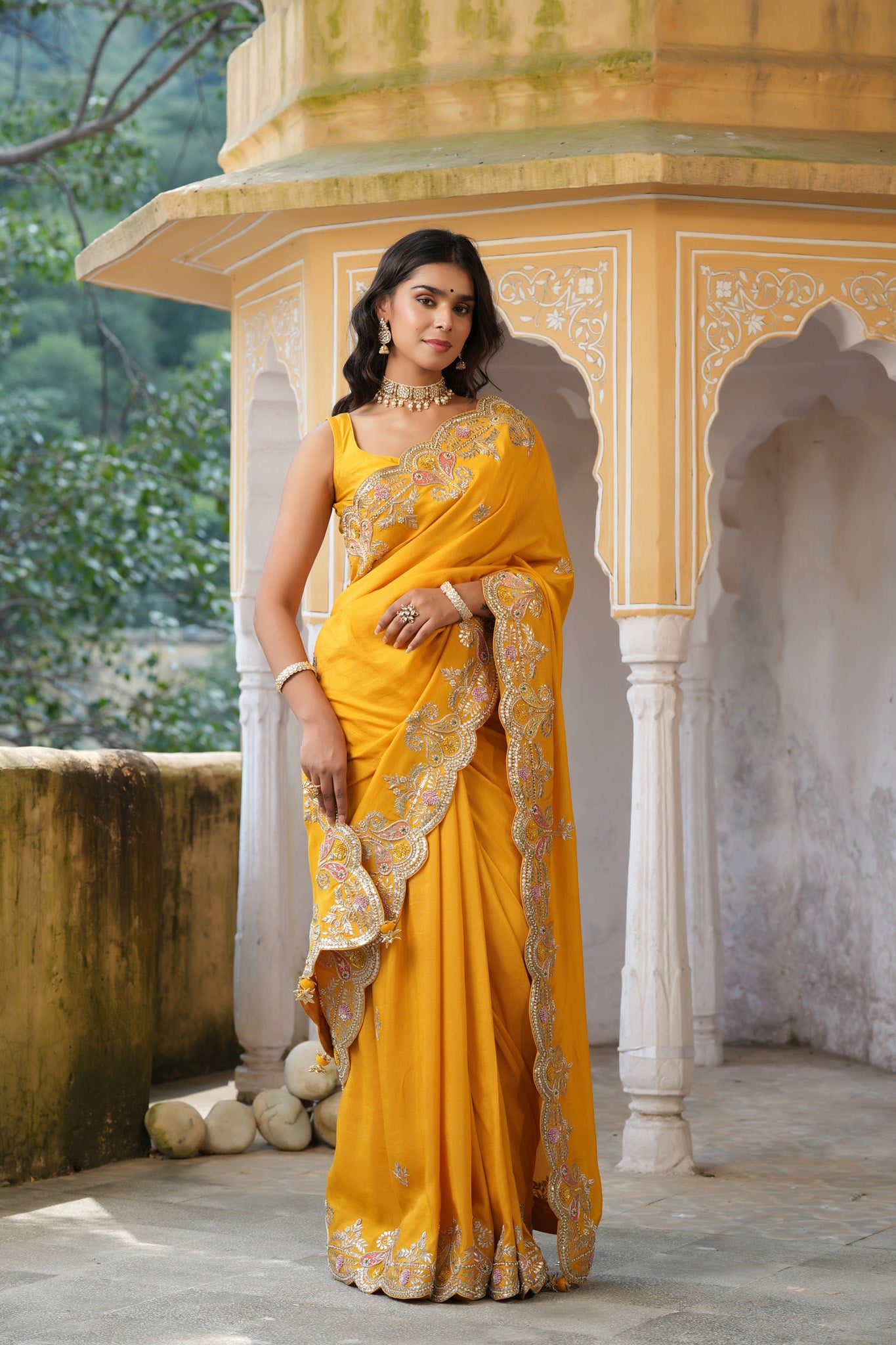 Buy beautiful yellow tussar georgette saree online in USA with hand embroidered border. Make a fashion statement at weddings with stunning designer sarees, embroidered sarees with blouse, wedding sarees, handloom sarees from Pure Elegance Indian fashion store in USA.-front