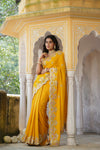 Buy beautiful yellow tussar georgette saree online in USA with hand embroidered border. Make a fashion statement at weddings with stunning designer sarees, embroidered sarees with blouse, wedding sarees, handloom sarees from Pure Elegance Indian fashion store in USA.-full view