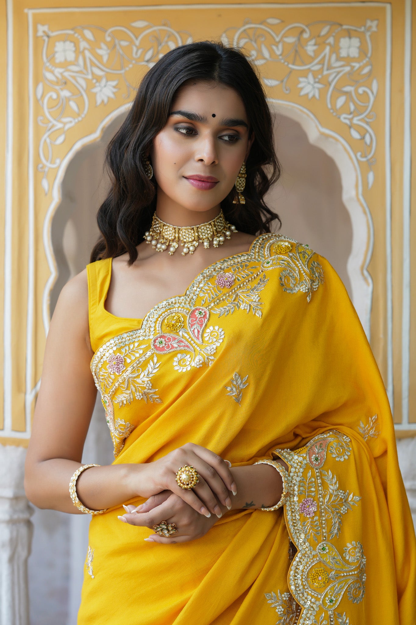 Buy beautiful yellow tussar georgette saree online in USA with hand embroidered border. Make a fashion statement at weddings with stunning designer sarees, embroidered sarees with blouse, wedding sarees, handloom sarees from Pure Elegance Indian fashion store in USA.-closeup