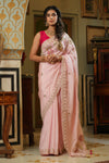 Buy light pink embroidered tussar georgette saree online in USA. Make a fashion statement at weddings with stunning designer sarees, embroidered sarees with blouse, wedding sarees, handloom sarees from Pure Elegance Indian fashion store in USA.-full view