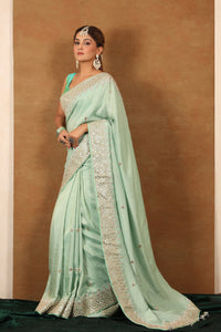 Buy mint green tussar georgette saree online in USA with gota work border. Make a fashion statement at weddings with stunning designer sarees, embroidered sarees with blouse, wedding sarees, handloom sarees from Pure Elegance Indian fashion store in USA.-full view