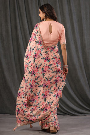 Shop light pink floral crepe saree online in USA with scalloped border. Make a fashion statement at weddings with stunning designer sarees, embroidered sarees with blouse, wedding sarees, handloom sarees from Pure Elegance Indian fashion store in USA.-back