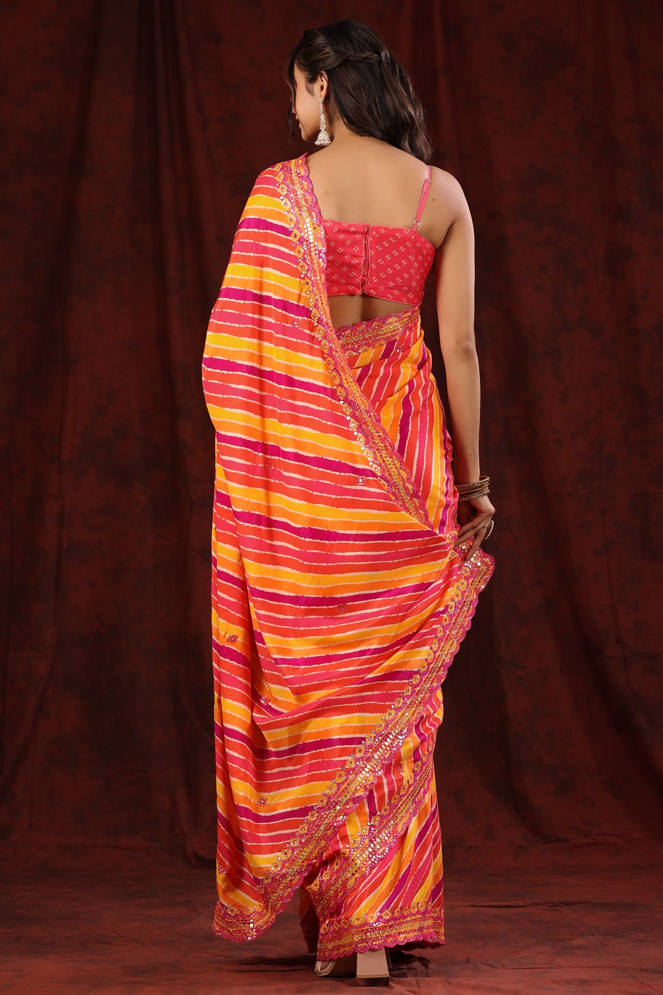 Shop multicolor stripes crepe sari online in USA with embroidered border. Make a fashion statement at weddings with stunning designer sarees, embroidered sarees with blouse, wedding sarees, handloom sarees from Pure Elegance Indian fashion store in USA.-back