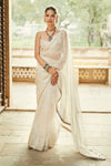 Shop an ivory mirror embroidered saree online in USA with saree blouse. Make a fashion statement on festive occasions and weddings with designer sarees, designer suits, Indian dresses, Anarkali suits, palazzo suits, designer gowns, sharara suits, and embroidered sarees from Pure Elegance Indian fashion store in USA.