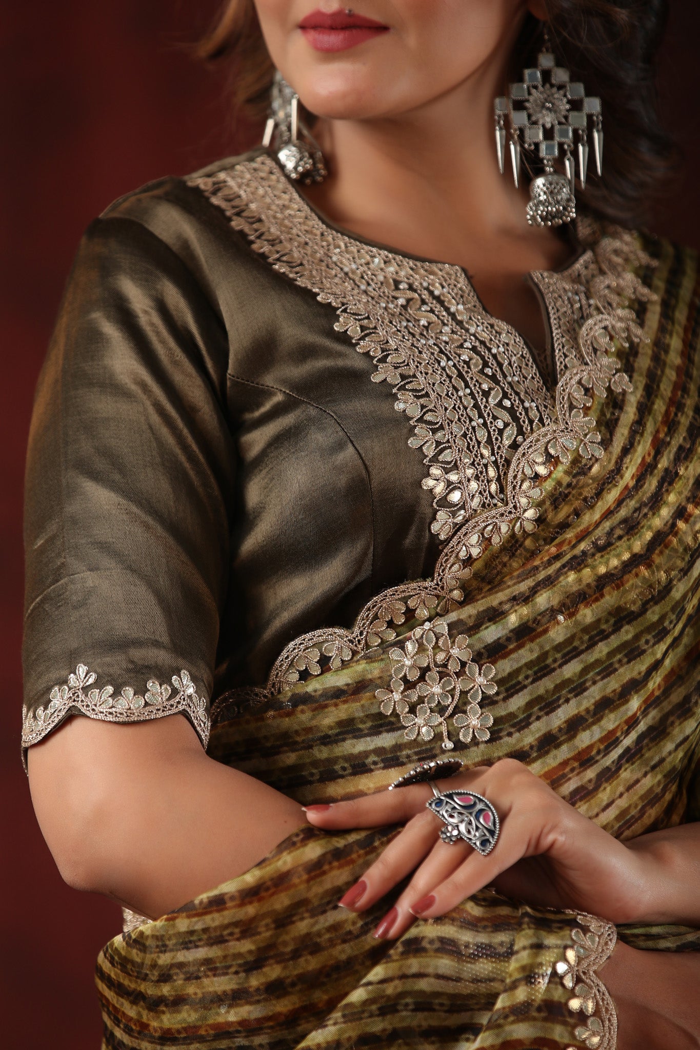 Buy brown printed embroidered organza saree online in USA with blouse. Make a fashion statement at weddings with stunning designer sarees, embroidered sarees with blouse, wedding sarees, handloom sarees from Pure Elegance Indian fashion store in USA.-details