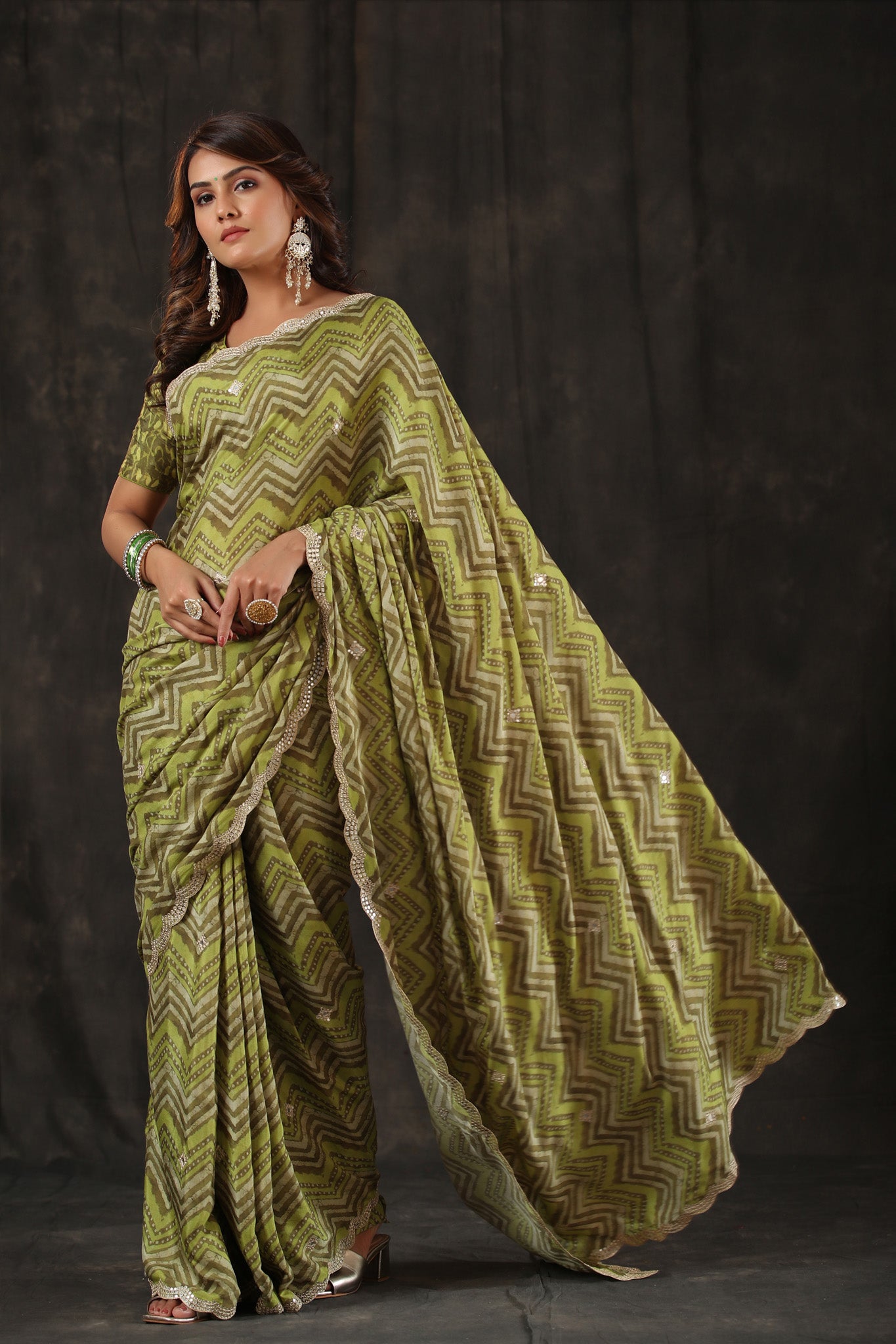 Shop pista green chevron print crepe saree online in USA with scalloped border. Make a fashion statement at weddings with stunning designer sarees, embroidered sarees with blouse, wedding sarees, handloom sarees from Pure Elegance Indian fashion store in USA.-pallu