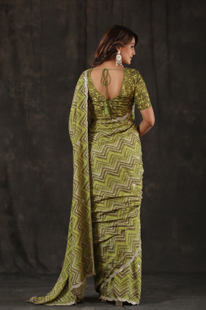 Shop pista green chevron print crepe saree online in USA with scalloped border. Make a fashion statement at weddings with stunning designer sarees, embroidered sarees with blouse, wedding sarees, handloom sarees from Pure Elegance Indian fashion store in USA.-back