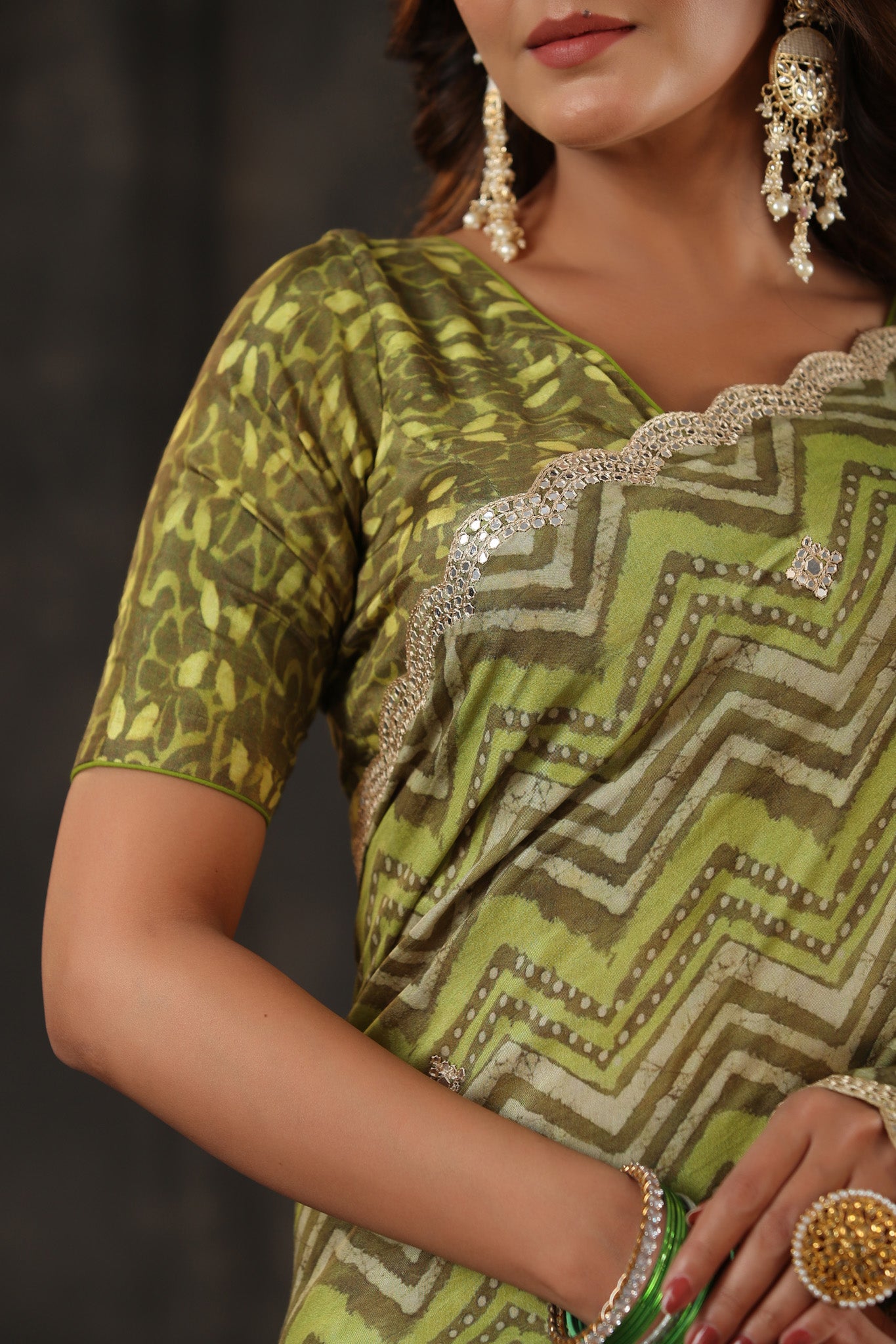 Shop pista green chevron print crepe saree online in USA with scalloped border. Make a fashion statement at weddings with stunning designer sarees, embroidered sarees with blouse, wedding sarees, handloom sarees from Pure Elegance Indian fashion store in USA.-blouse