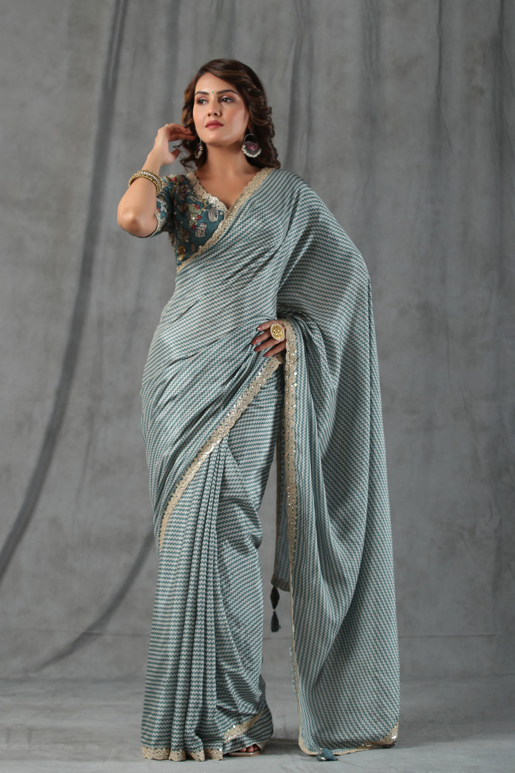 Buy sage green chevron print crepe saree online in USA with scalloped border. Make a fashion statement at weddings with stunning designer sarees, embroidered sarees with blouse, wedding sarees, handloom sarees from Pure Elegance Indian fashion store in USA.-full view