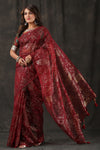 Buy maroon organza saree online in USA with designer Kalamkari blouse. Make a fashion statement at weddings with stunning designer sarees, embroidered sarees with blouse, wedding sarees, handloom sarees from Pure Elegance Indian fashion store in USA.-full view