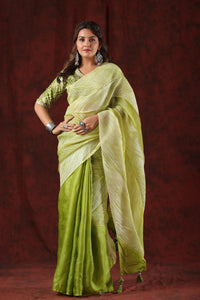 Shop pista green striped tussar silk saree online in USA with bandhej blouse. Make a fashion statement at weddings with stunning designer sarees, embroidered sarees with blouse, wedding sarees, handloom sarees from Pure Elegance Indian fashion store in USA.-full view