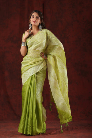 Shop pista green striped tussar silk saree online in USA with bandhej blouse. Make a fashion statement at weddings with stunning designer sarees, embroidered sarees with blouse, wedding sarees, handloom sarees from Pure Elegance Indian fashion store in USA.-front