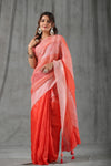 Buy bright red striped tussar silk saree online in USA with bandhej blouse. Make a fashion statement at weddings with stunning designer sarees, embroidered sarees with blouse, wedding sarees, handloom sarees from Pure Elegance Indian fashion store in USA.-full view