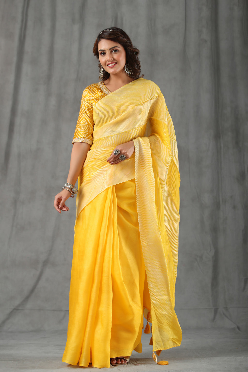 Buy yellow stripes tussar silk saree online in USA with bandhej blouse. Make a fashion statement at weddings with stunning designer sarees, embroidered sarees with blouse, wedding sarees, handloom sarees from Pure Elegance Indian fashion store in USA.-full view