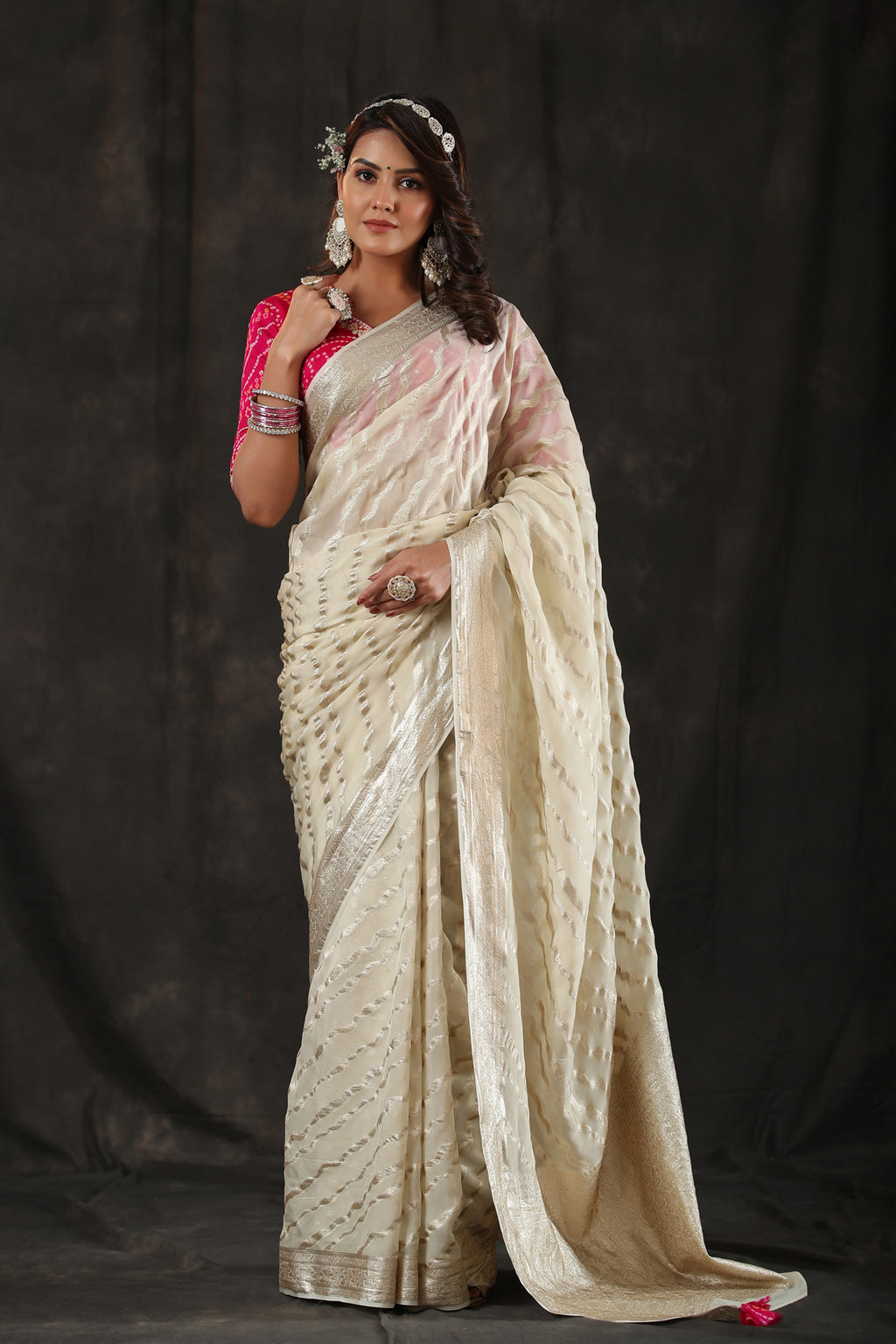 Buy cream georgette Banarasi saree online in USA with zari stripes. Make a fashion statement at weddings with stunning designer sarees, embroidered sarees with blouse, wedding sarees, handloom sarees from Pure Elegance Indian fashion store in USA.-full view