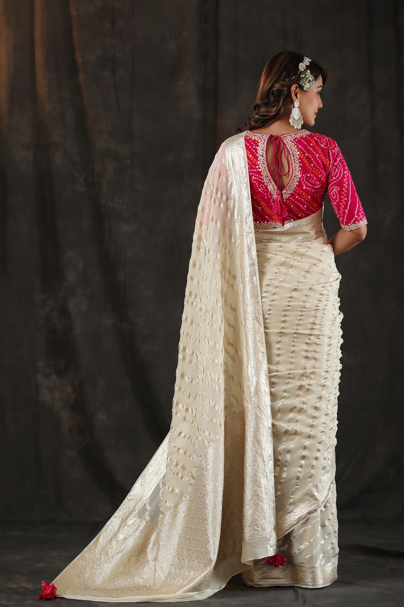 Buy cream georgette Banarasi saree online in USA with zari stripes. Make a fashion statement at weddings with stunning designer sarees, embroidered sarees with blouse, wedding sarees, handloom sarees from Pure Elegance Indian fashion store in USA.-back
