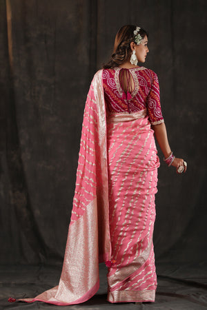Buy beautiful light pink georgette Banarasi saree online in USA with zari stripes. Make a fashion statement at weddings with stunning designer sarees, embroidered sarees with blouse, wedding sarees, handloom sarees from Pure Elegance Indian fashion store in USA.-back
