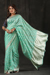 Shop mint green georgette Banarasi saree online in USA with zari stripes. Make a fashion statement at weddings with stunning designer sarees, embroidered sarees with blouse, wedding sarees, handloom sarees from Pure Elegance Indian fashion store in USA.-full view