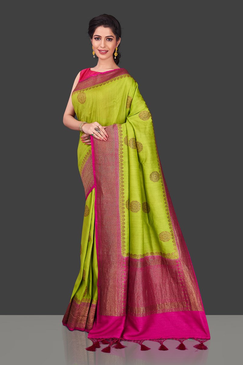 Buy pista green muga Banarasi saree online in USA with pink zari border. Shop beautiful Banarasi sarees, georgette sarees, pure muga silk sarees in USA from Pure Elegance Indian fashion boutique in USA. Get spoiled for choices with a splendid variety of Indian saris to choose from! Shop now.-full view