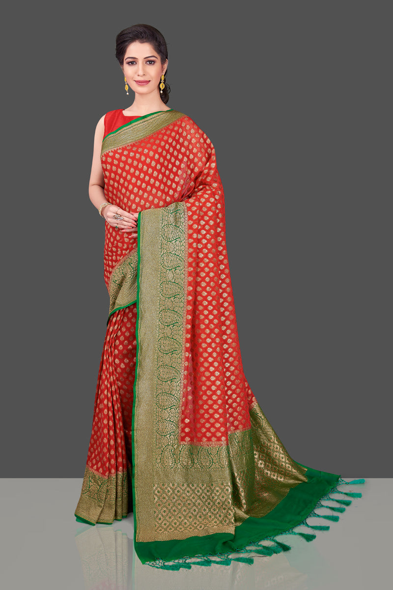 Buy beautiful red georgette Banarasi saree online in USA with green antique zari border. Shop beautiful Banarasi sarees, georgette sarees, pure muga silk sarees in USA from Pure Elegance Indian fashion boutique in USA. Get spoiled for choices with a splendid variety of Indian saris to choose from! Shop now.-full view