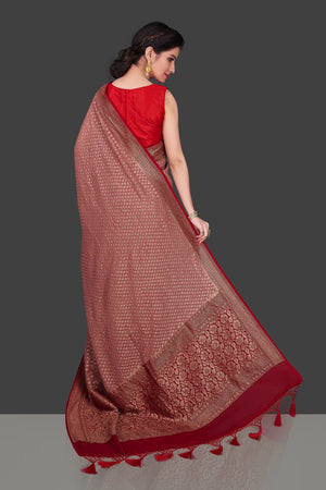 Buy charming dusty pink georgette Banarasi saree online in USA with red zari border. Shop beautiful Banarasi sarees, georgette sarees, pure muga silk sarees in USA from Pure Elegance Indian fashion boutique in USA. Get spoiled for choices with a splendid variety of Indian saris to choose from! Shop now.-back