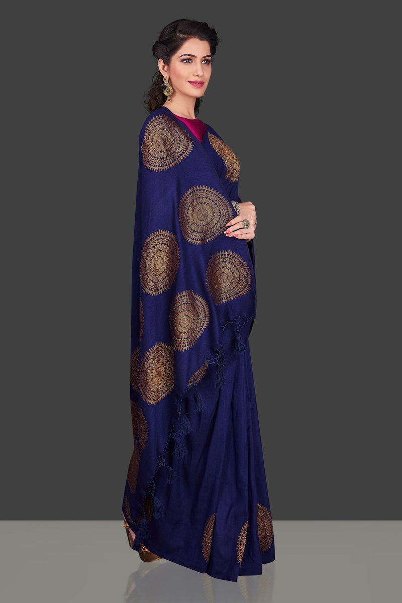 Shop navy borderless muga Banarasi saree online in USA with big antique zari buta. Shop beautiful Banarasi sarees, georgette sarees, pure muga silk sarees in USA from Pure Elegance Indian fashion boutique in USA. Get spoiled for choices with a splendid variety of designer saris to choose from! Shop now.-side