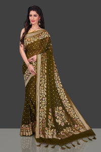 Buy mehendi green Benarasi georgette saree online in USA with floral zari border. Shop beautiful Banarasi georgette sarees, tussar sarees, pure muga silk saris in USA from Pure Elegance Indian fashion boutique in USA. Get spoiled for choices with a splendid variety of Indian sarees to choose from! Shop now.-full view