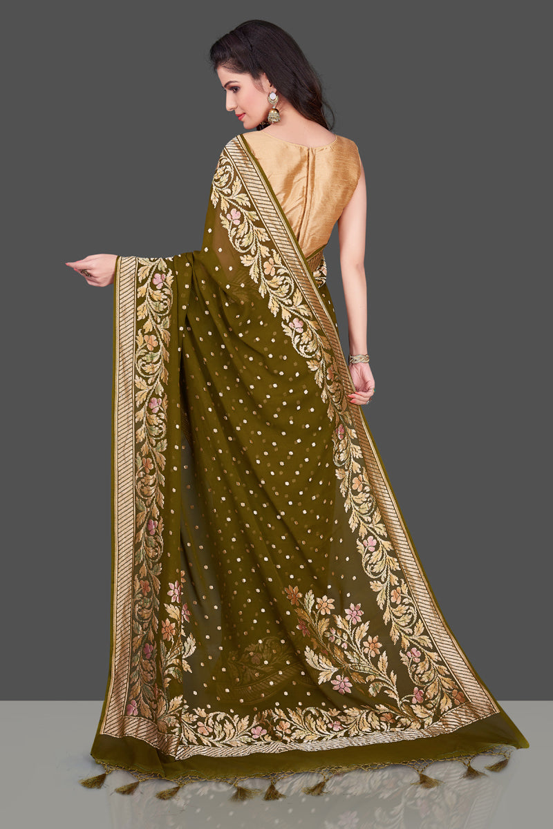 Buy mehendi green Benarasi georgette saree online in USA with floral zari border. Shop beautiful Banarasi georgette sarees, tussar sarees, pure muga silk saris in USA from Pure Elegance Indian fashion boutique in USA. Get spoiled for choices with a splendid variety of Indian sarees to choose from! Shop now.-back