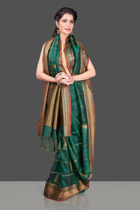 Shop beautiful dark green zari check tassar Banarasi sari in USA with antique zari border. Shop beautiful Banarasi georgette sarees, tussar saris, pure muga silk saris in USA from Pure Elegance Indian fashion boutique in USA. Get spoiled for choices with a splendid variety of Indian sarees to choose from! Shop now.-full view