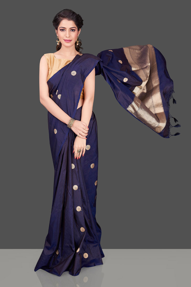 Buy navy blue borderless Banarasi saree in USA with polka zari buta. Shop beautiful Banarasi georgette sarees, tussar saris, pure muga silk saris in USA from Pure Elegance Indian fashion boutique in USA. Get spoiled for choices with a splendid variety of Indian sarees to choose from! Shop now.-full view