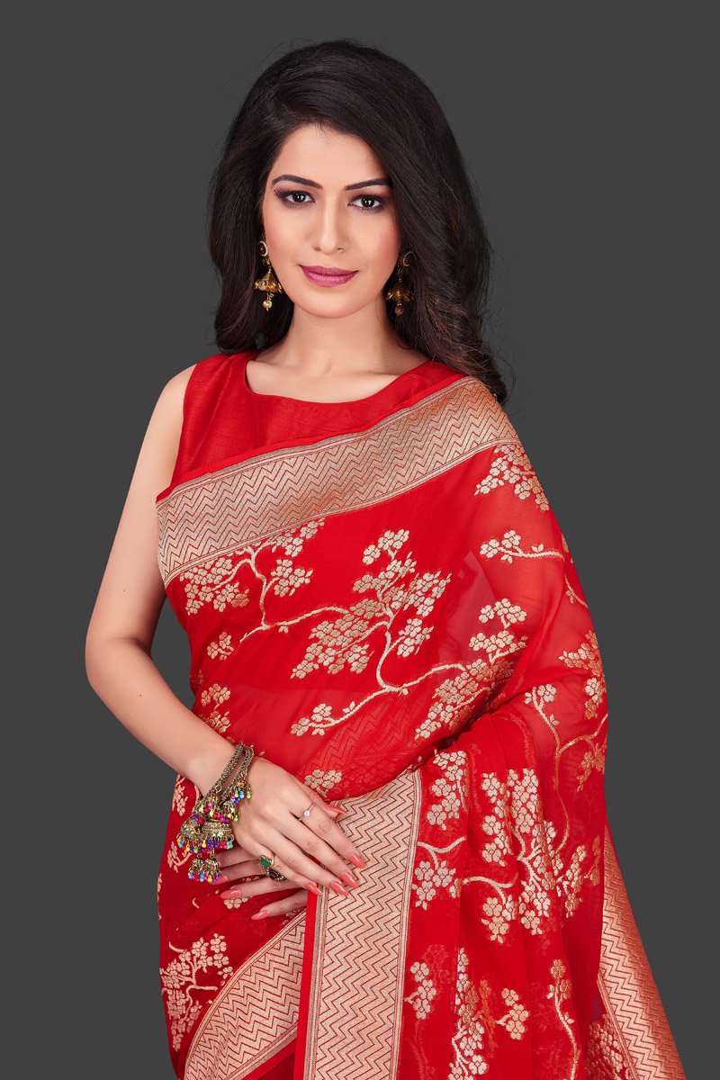 Buy online beautiful red Benarasi georgette saree in USA with floral zari work. Shop beautiful Banarasi georgette sarees, tussar saris, pure muga silk saris in USA from Pure Elegance Indian fashion boutique in USA. Get spoiled for choices with a splendid variety of Indian sarees to choose from! Shop now.-closeup