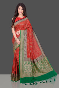 Shop stunning red georgette Benarasi saree in USA with black green zari border. Shop beautiful Banarasi georgette sarees, tussar saris, pure muga silk saris in USA from Pure Elegance Indian fashion boutique in USA. Get spoiled for choices with a splendid variety of Indian sarees to choose from! Shop now.-full view