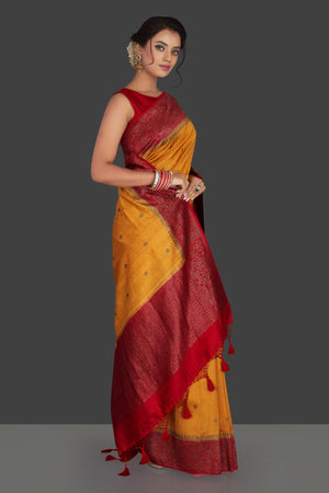 Shop mustard Banarasi silk sari online in USA with antique zari red border. Keep it elegant with handwoven sarees, Banarasi silk sarees, soft silk sarees from Pure Elegance Indian fashion boutique in USA. We bring a especially curated collection of ethnic sarees for Indian women in USA under one roof!-side