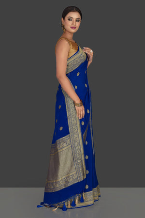Shop beautiful indigo blue georgette Banarasi saree online in USA with zari border. Radiate elegance with georgette sarees, Banarasi sarees, handwoven sarees from Pure Elegance Indian fashion boutique in USA. We bring a especially curated collection of ethnic sarees for Indian women in USA under one roof!-side