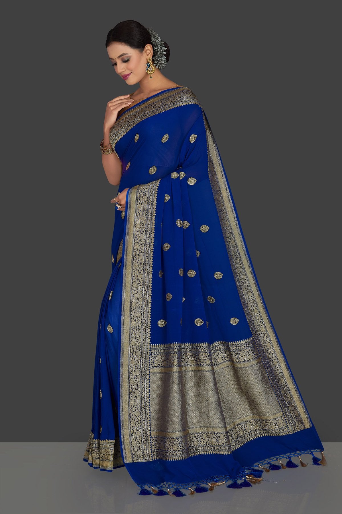 Shop beautiful indigo blue georgette Banarasi saree online in USA with zari border. Radiate elegance with georgette sarees, Banarasi sarees, handwoven sarees from Pure Elegance Indian fashion boutique in USA. We bring a especially curated collection of ethnic sarees for Indian women in USA under one roof!-pallu