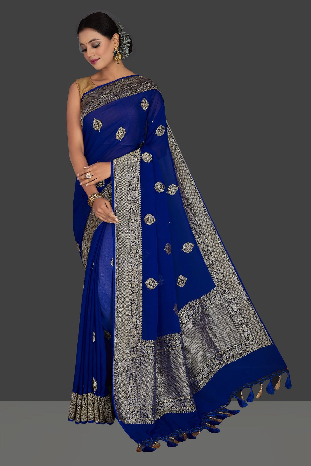 Buy gorgeous indigo blue georgette Benarasi sari online in USA with zari border. Radiate elegance with georgette sarees, Banarasi sarees, handwoven sarees from Pure Elegance Indian fashion boutique in USA. We bring a especially curated collection of ethnic sarees for Indian women in USA under one roof!-full view