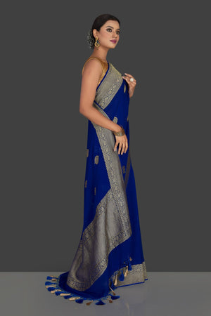 Buy gorgeous indigo blue georgette Benarasi sari online in USA with zari border. Radiate elegance with georgette sarees, Banarasi sarees, handwoven sarees from Pure Elegance Indian fashion boutique in USA. We bring a especially curated collection of ethnic sarees for Indian women in USA under one roof!-side