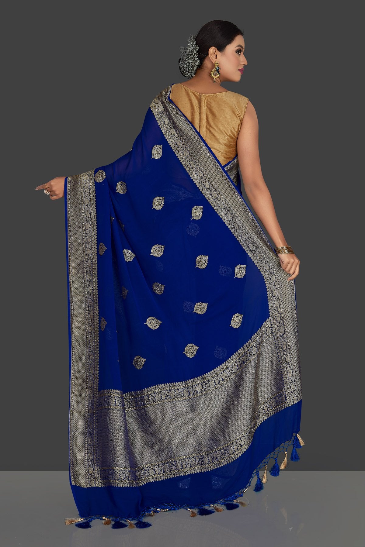 Buy gorgeous indigo blue georgette Benarasi sari online in USA with zari border. Radiate elegance with georgette sarees, Banarasi sarees, handwoven sarees from Pure Elegance Indian fashion boutique in USA. We bring a especially curated collection of ethnic sarees for Indian women in USA under one roof!-back