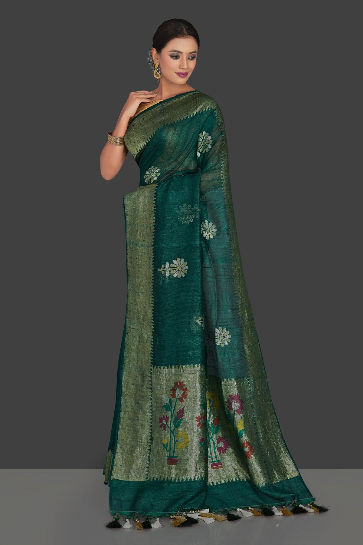Buy elegant dark green tassar georgette Banarsi saree online in USA with flower buta. Radiate elegance with georgette sarees, Banarasi sarees, handwoven sarees from Pure Elegance Indian fashion boutique in USA. We bring a especially curated collection of ethnic sarees for Indian women in USA under one roof!-pallu