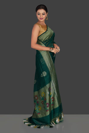 Buy elegant dark green tassar georgette Banarsi saree online in USA with flower buta. Radiate elegance with georgette sarees, Banarasi sarees, handwoven sarees from Pure Elegance Indian fashion boutique in USA. We bring a especially curated collection of ethnic sarees for Indian women in USA under one roof!-side